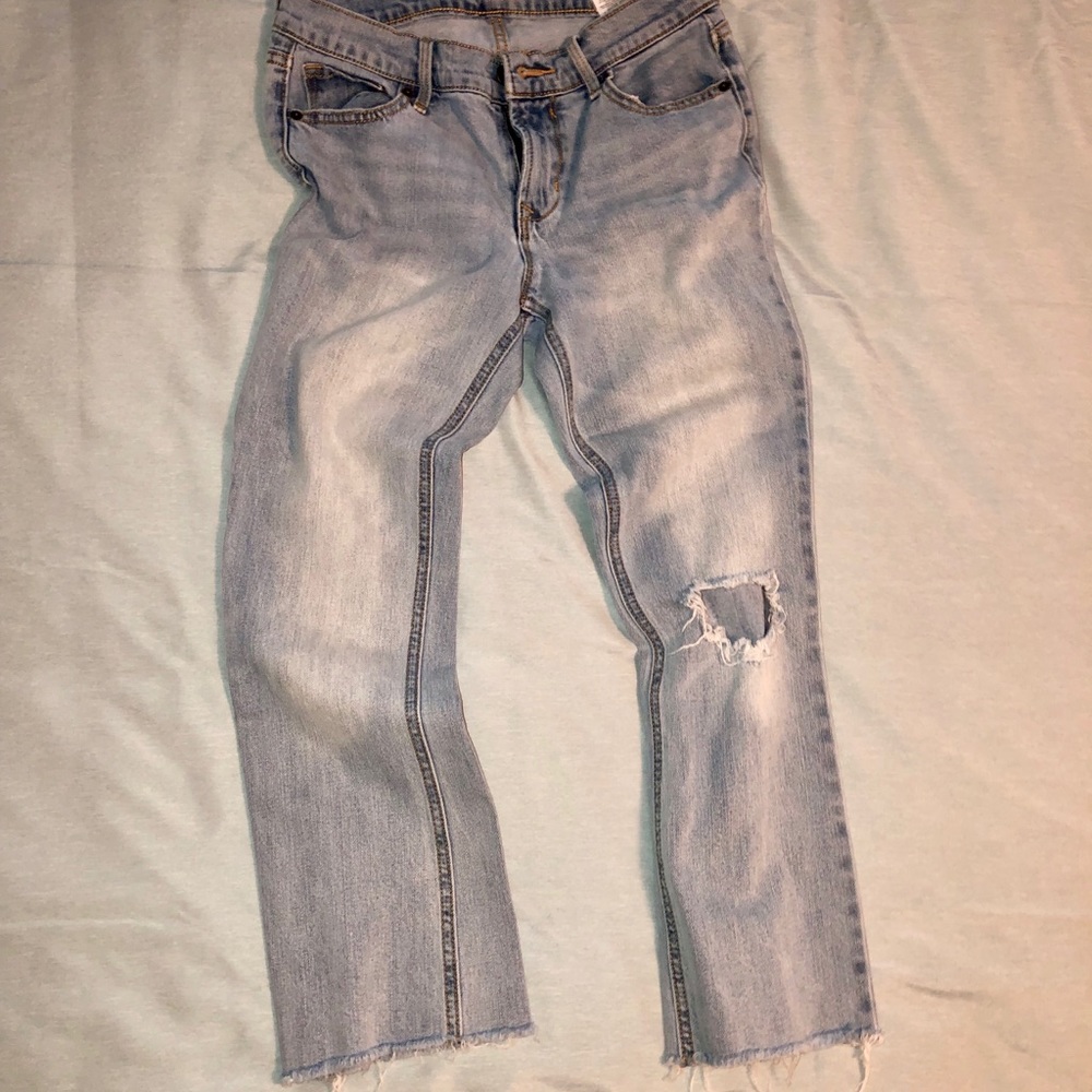 Jean capris with cut out on knee